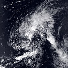 Satellite image of a weak tropical cyclone. The storm is characterized by disorganized cloud cover that encompasses most of the image. No land masses are visible in the image.