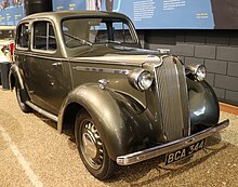 The 10-4 of 1937 was the first mass-production British unibody saloon car and was called "The PS1 Million Motor Car" after its costly and extensive development programme. 1937 Vauxhall H-type Ten 1.2 Front.jpg