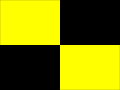 דגל ריבועים שחור-צהוב מתריע על תקרית במסלול המחייבת את המתחרה הראשון שמגיע לקו הסיום להאט כדי למתן את הקצב של שאר המתחרים