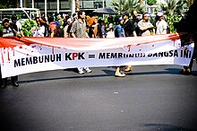 Rally in support of the KPK. Slogan translates as "Killing the KPK = killing this nation". Corruption Eradication Commission rally.jpg