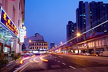 Evening scene of Jalan Besar at the junction with Allenby Road. Evening scene, Jalan Besar (21151237249).jpg