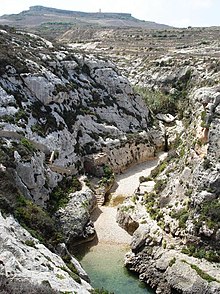 A canyon between two cliffs.