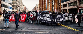 MACC organizing a protest during DisruptJ20 Inauguration Approach Frankling Park.jpg