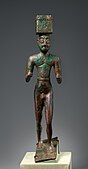 Man carrying a box, possibly for offerings. Metalwork, ca. 2900–2600 BCE, Sumer. Metropolitan Museum of Art.
