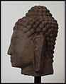 7th century Mon/Dvaravati sandstone head of Buddha. Side.