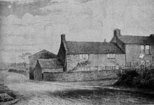 Black-and-white drawing of a two-story brick house along a road.