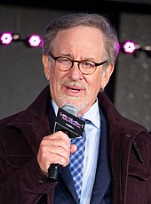 Steven Spielberg shown talking into a microphone