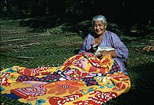 Woman sewing a tivaevae, Rarotonga. Woman sewing a tivaevae, Rarotonga.jpg