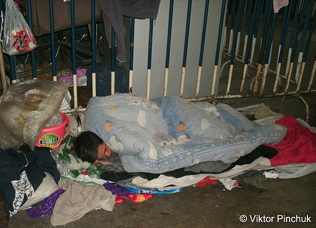 One of the inhabitants of the railway station in whose company the Russian traveller spent the night; Guangzhou, China (Photo from book by Pinchuk Viktor "Six months by islands... and countries")