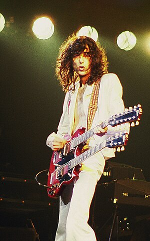 English: Jimmy Page of Led Zeppelin, in concer...