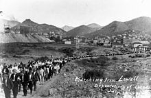 Workers being forcibly marched away from Bisbee into the desert Bisbee deportation lowell.jpg