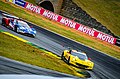 A Chevrolet Corvette C7.R in front of a Ford GT in the GTLM class at Petit Le Mans