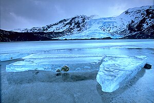 Gígjökull, an outlet glacier extending from Ey...