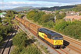 56 094 mit Holzzug in Briton Ferry (2013)