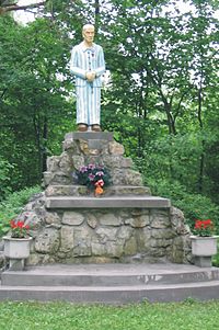 A monument to Fr. Maximilian Kolbe, among the estimated 3,000 members (18%) of the Polish clergy who were killed by the Nazis; of these, 1,992 died in concentration camps. Kosciol MB Ostrobramskiej w Chrzanowie 13.jpg