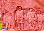 Joffre with French soldier surrounded by his Generals as carved at the base of the Mondemont memorial.