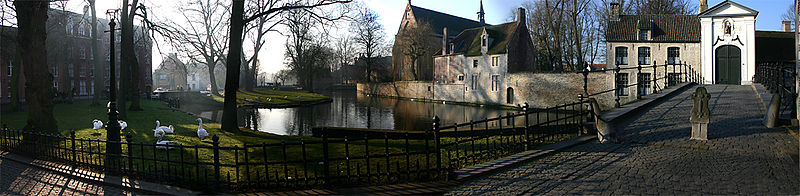 Outside of the Beguinage, with the Minnewater Park in the background.