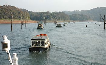 tourists in boats in the Periyar National Park...