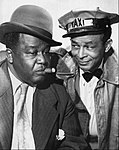 Spencer Williams (1893–1969) was a groundbreaking actor-director-filmmaker. He portrayed Andy on the Amos 'n' Andy TV show (Alvin Childress is pictured with him above in 1952). He also directed the 1941 race film The Blood of Jesus.
