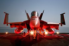 F/A-18E/F Super Hornet parked on the flight deck of Dwight D. Eisenhower, as the ship operates in the Persian Gulf, December 2006. Super Hornet on flight deck.jpg