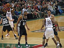 Duncan defending in the key against the Milwaukee Bucks in 2008 Tim Duncan in the paint.jpg