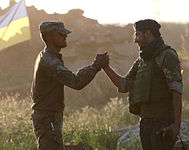 Greeting a Ukrainian soldier at the checkpoint "Jolly Mountain" near Luhansk, 18 August 2014