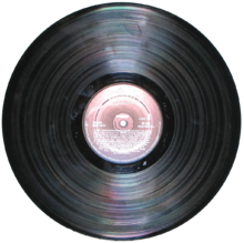 Most LPs were pressed in black vinyl with a paper label in the center of each side. However, colored and picture discs were also made