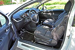 2010_Peugeot_207_Urban_Move_white_2dr_interior_from_drivers_side