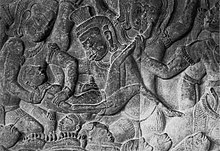 Bas-relief at Angkor Wat, Cambodia, c. 1150, depicting a demon inducing an abortion by pounding the abdomen of a pregnant woman with a pestle AngkorWatAbortionAD1150.JPG