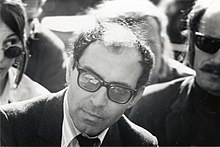 http://upload.wikimedia.org/wikipedia/commons/thumb/8/8f/Jean-Luc_Godard_at_Berkeley,_1968_(1).jpg/220px-Jean-Luc_Godard_at_Berkeley,_1968_(1).jpg