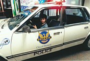 John interacting in the 1980's Chevrolet Celebrity Police Cruiser.