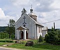 cerkiew greckokatolicka, ob. kościół rzymskokatolicki filialny pw. Narodzenia NMP dzwonnica nagrobek Marie Chwapilowej