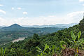 The mountainous area around the river.