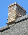 The stones protect the joins of thatched roofs