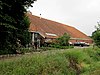 Grote boerderij van het Oldambster type met brede schuur