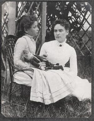 1888 photo of Helen Keller holding a doll. Wit...