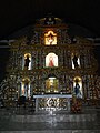 The high altar and main retablo of St. Mary Magdalene Church