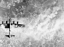 103 Squadron Lancaster over the German V-2 launch site at Wizernes, France Lancaster over Wizernes WWII IWM C 4505.jpg