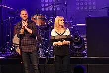 West on stage with Renee Napier, whose story inspired his song "Forgiveness" Matthew West on stage with Forgiveness inspiration Renee Napier.jpg