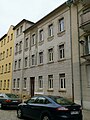 Mietshaus in geschlossener Bebauung (Doppelhaus mit Nr. 45)