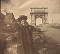 Photograph of Susan Watkins at the Arch of Titus in Rome, ca. 1896-1908 from the Jean Outland Chrysler Library