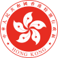 A red circular emblem, with a white 5-petalled flower design in the centre, and surrounded by the words "Hong Kong" and ""