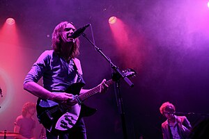 http://upload.wikimedia.org/wikipedia/commons/thumb/9/90/Tame_Impala_Performing_in_NYC.jpg/300px-Tame_Impala_Performing_in_NYC.jpg
