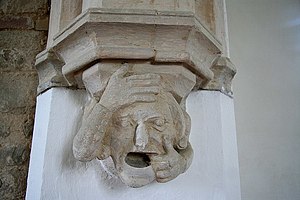 English: Toothache 13th century corbel head on...