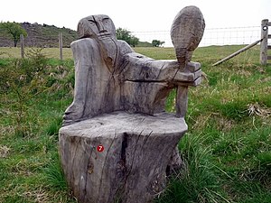 English: Wooden seat sculpture, Harehope Quarr...