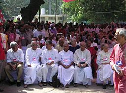 Jyoti Basu (extreme right front row) in the inaugural session of the 18th Congress of the CPI(M) in Delhi. Seated in the front row from the extreme left are Prakash Karat, Buddhadeb Bhattacharya, Manik Sarkar, V. S. Achuthanandan & K. Satyanarayana Cpmleadership18thcongress.jpg