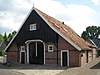 Boerderij met sporen van vakwerk in de achtergevel