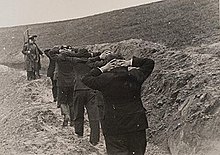 Polish teachers from Bydgoszcz guarded by members of Volksdeutscher Selbstschutz before execution Dolina smierci Bydgoszcz.jpg