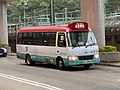 Red minibuses shuttle between Nan Fung Cotton Mills and MTR Tsuen Wan Station, stopping at the waiting area opposite the Tsuen Wan Government Office near Exit A4 of Tsuen Wan Station.