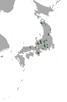 Carte du Japon avec quelques petites taches éparses sur Honshu